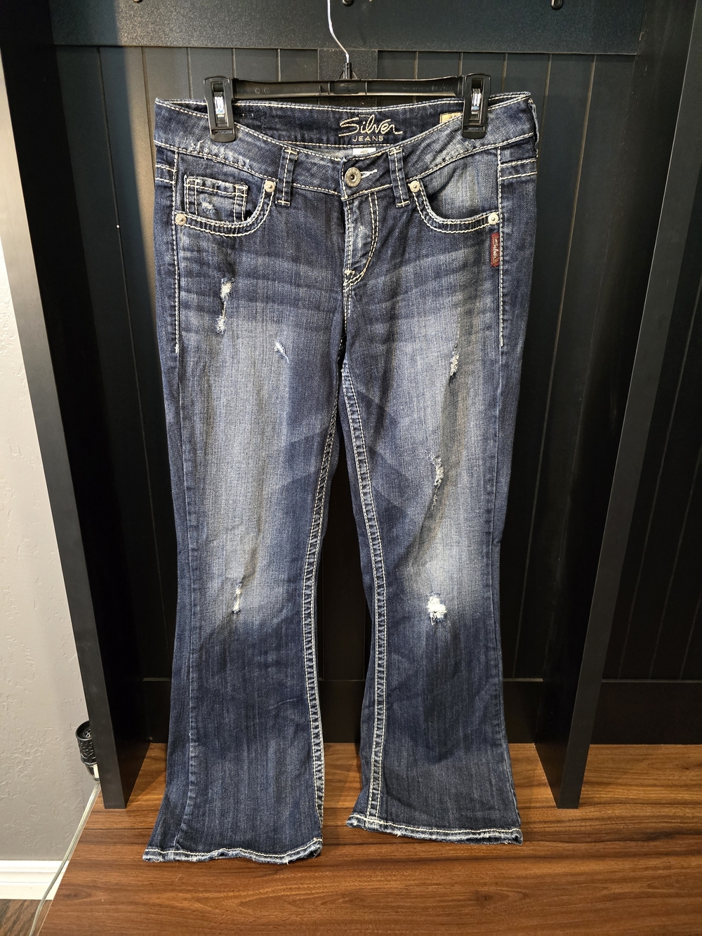 Silver Jeans Women's Dark Blue Flare Jeans with Distressed Detail
